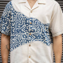Close-up of Dabu block print, Kantha stitching and coconut shell buttons