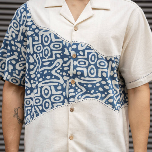 Close-up of Dabu block print, Kantha stitching and coconut shell buttons