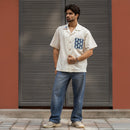Phulkari shirt styled with blue denim, full length