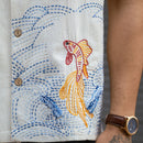Close-up of hand-embroidered fish and Kantha work on handloom Khadi