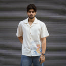 Fish & Flow Khadi Cuban collar shirt with hand-embroidered koi and Kantha waves, front view