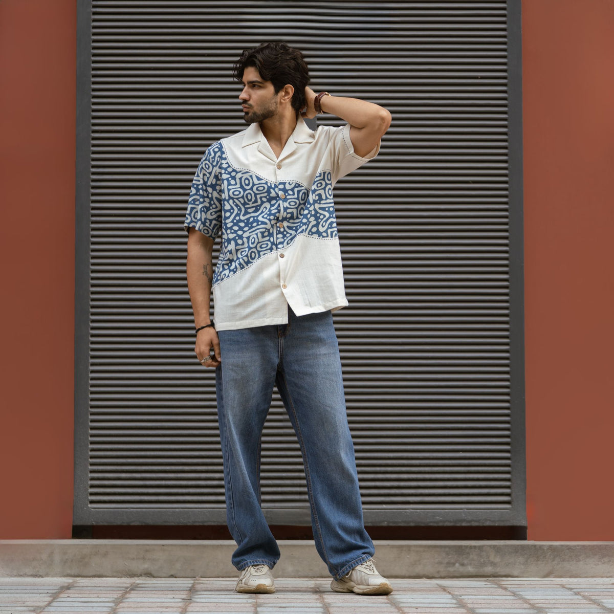 Dabu Drift shirt styled with blue denim, full length