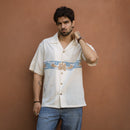 Sea Drift ecru khadi shirt front, hand-appliqued sea-life border and coconut wood buttons