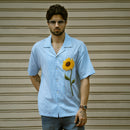 Sunflower check shirt – blue and white gingham cotton shirt with hand-embroidered sunflower, front view
