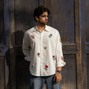 Man wearing Valley of Blooms white floral French knot embroidered full sleeve shirt